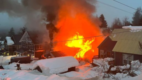 Multiple homes damaged, woman killed in Roslyn fire