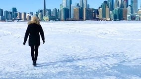 Toronto woman 'walks' on frozen water across Lake Ontario