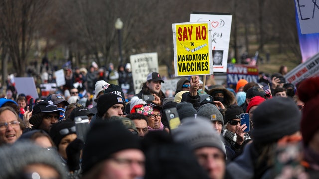 Biden administration officially withdraws COVID-19 vaccine rule