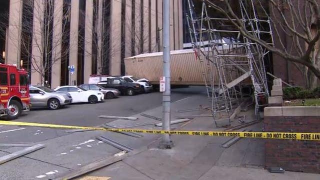 Semi crashes into scaffolding of building under construction in Downtown Seattle