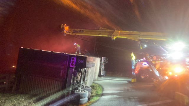 Cattle truck crashes, lands on its side in Stanwood