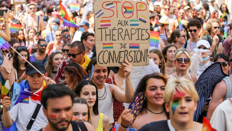 A participant seen holding a placard expressing his opinion