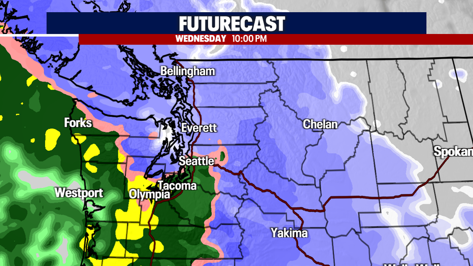 Lowland snow transitions into widespread and heavy rain overnight