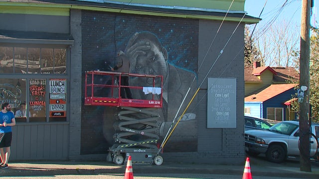 Artist restores defaced Seattle MLK mural with 18K donations