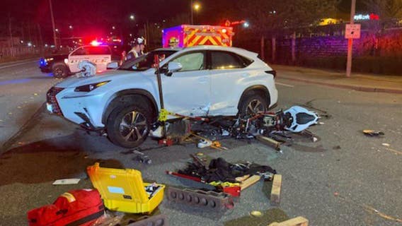 Motorcyclist hospitalized with life-threatening injuries after crash with car