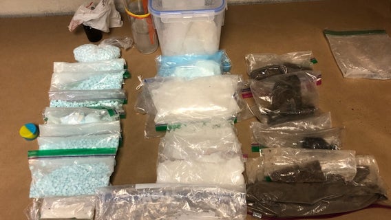 Police recover stolen gun, more than $35K in cash and drugs in Marysville; man arrested