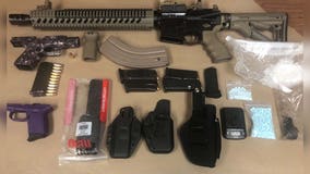 Everett Police: Felon pulled over for traffic offense, guns and drugs found in car