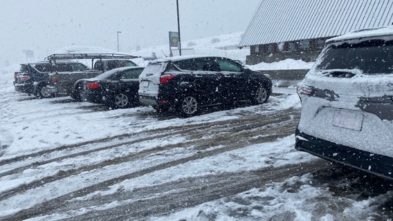 Snoqualmie Pass snowfall challenges drivers Sunday