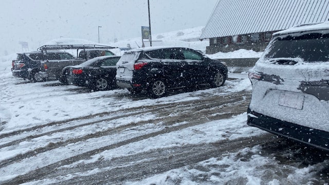 Snoqualmie Pass snowfall challenges drivers Sunday