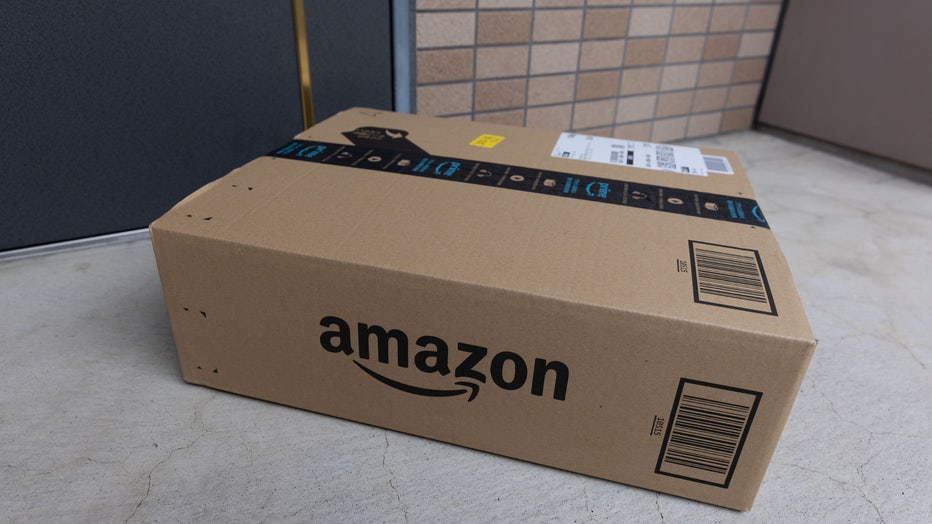 An Amazon delivery package seen in front of a door. (Photo by Stanislav Kogiku/SOPA Images/LightRocket via Getty Images)
