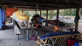 City sweeps homeless encampment at Woodland Park, park closed through the week