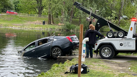 Crews recover submerged car from Old Fishing Hole in Kent