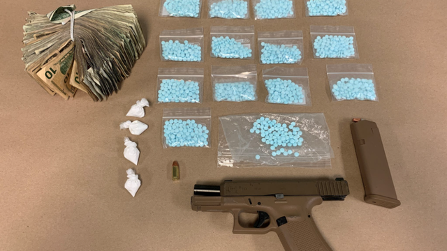 Seattle Police arrest suspected drug dealer, seize drugs, cash and handgun