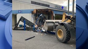 Lynnwood police search for burglar who stole a front-loader and rammed it into a bank