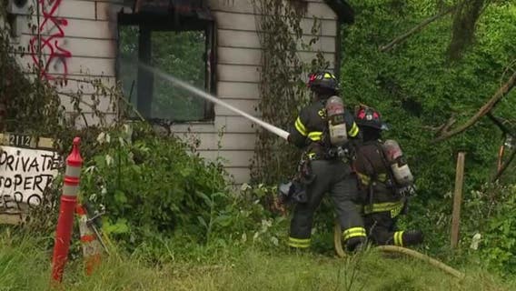 Crews investigating after an abandoned building caught on fire in Seattle