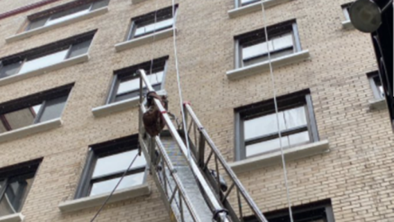 Crews rescue man hanging from collapsed scaffolding in downtown Seattle