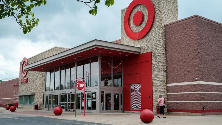A woman walks in front of a Target store at Monroe