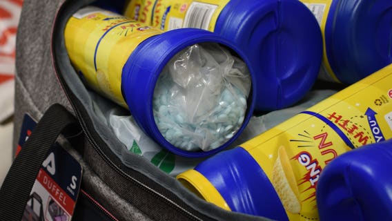 Authorities seize 91,000 fentanyl pills hidden inside chip containers in Bellingham, 2 arrested