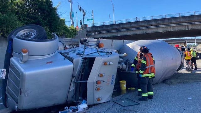 Concrete mixer rollover snarled traffic on I-5 North in Seattle; caused 6-mile backup
