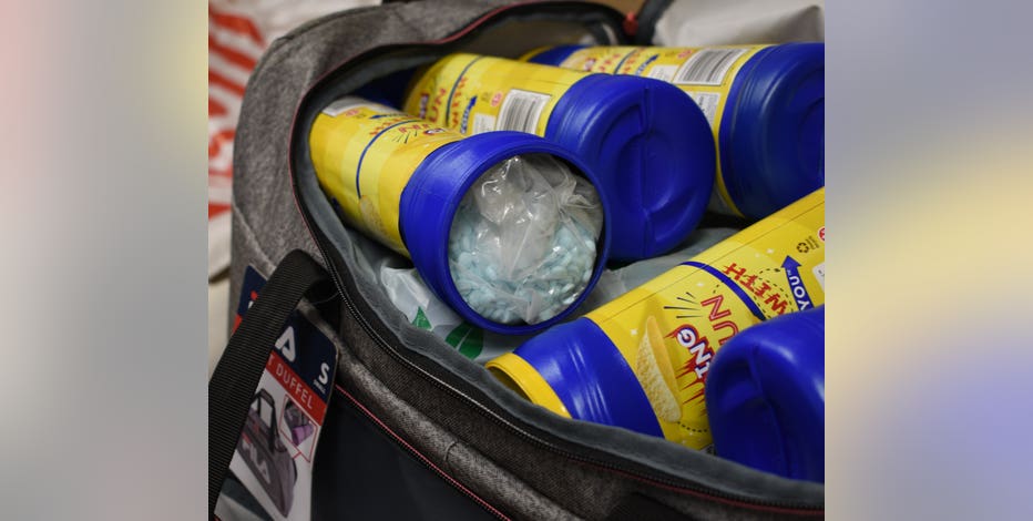 Authorities seize 91,000 fentanyl pills hidden inside chip containers in Bellingham, 2 arrested