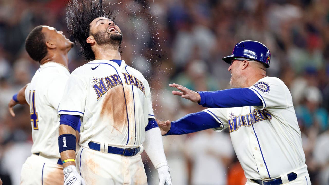 Eugenio Suarez of the Seattle Mariners celebrates his walk-off home News  Photo - Getty Images