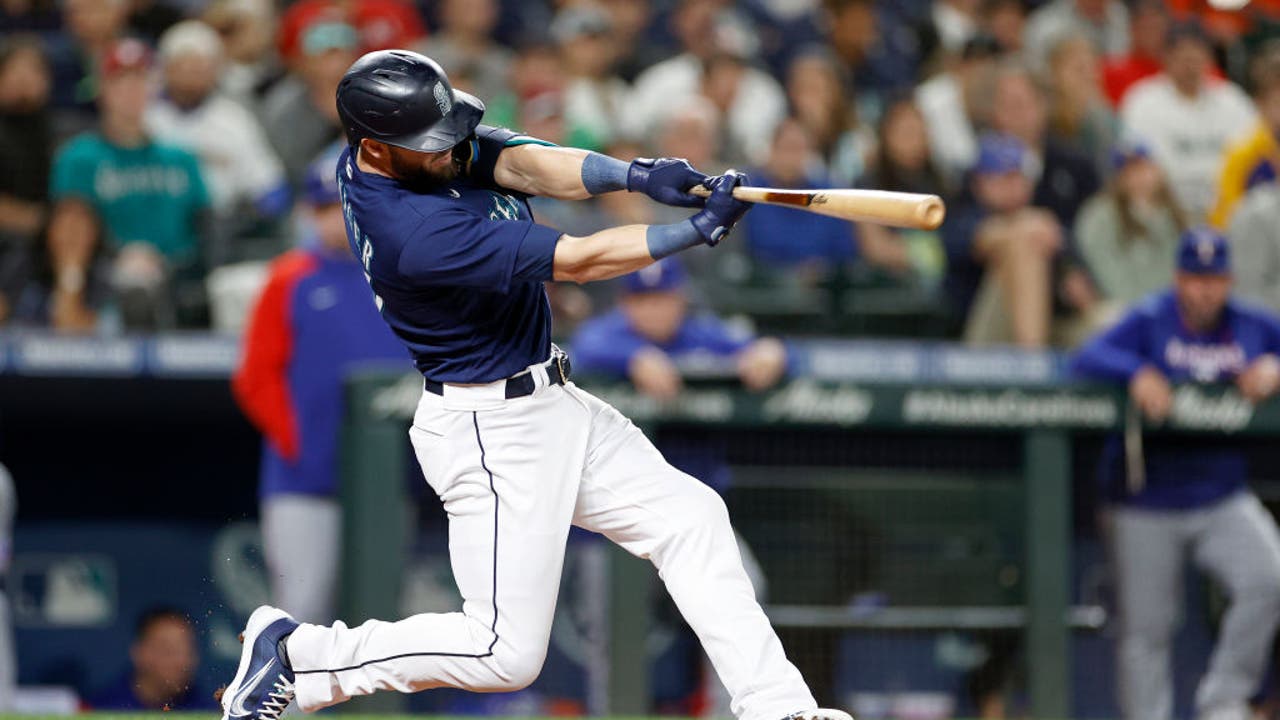 Haniger hits 2 HRs, M's beat A's to gain in wild-card race
