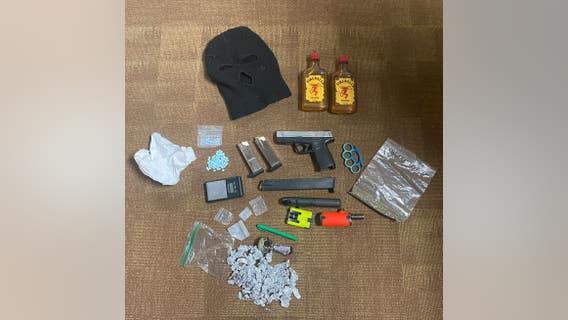 Police: Loaded gun, pills seized from suspected fentanyl dealer in Federal Way