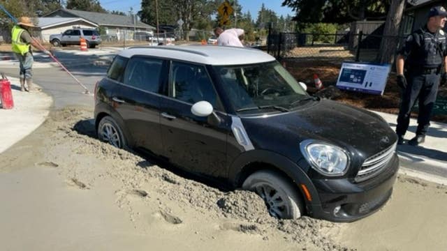 Lakewood Police: Mother drives stolen car through freshly poured concrete, with child in backseat