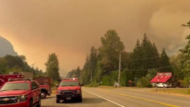 US 2 reopens as crews continue battling Bolt Creek Fire