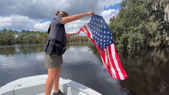Florida deputies rescue American flag from swollen river after Hurricane Ian