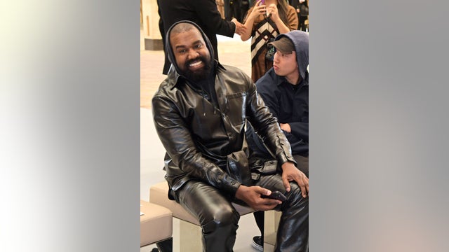 Kanye West wearing White Lives Matter shirt during his Yeezy show in Paris