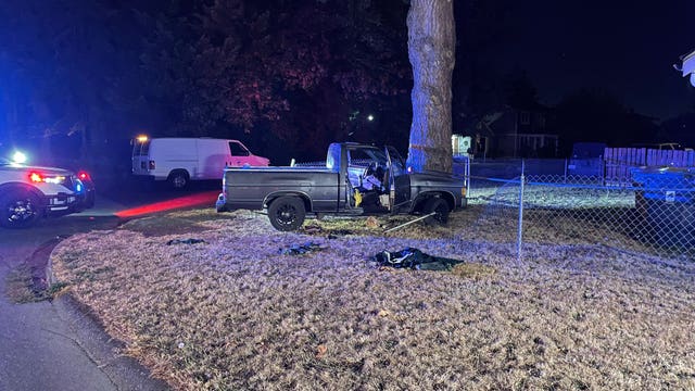 Police: Man shot, found in pickup truck that crashed in Tacoma yard