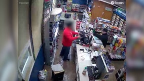 VIDEO: Suspect robs Spanaway gas station at gunpoint, still on the loose