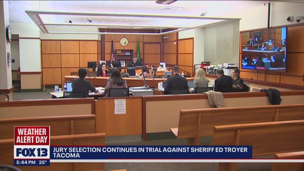 State says Sheriff Ed Troyer texted their potential witness during pre-trial
