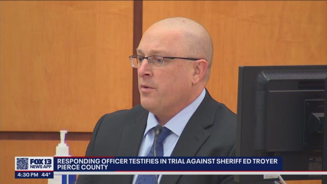 Officer says he wanted to testify the 'facts' in trial against Sheriff Ed Troyer