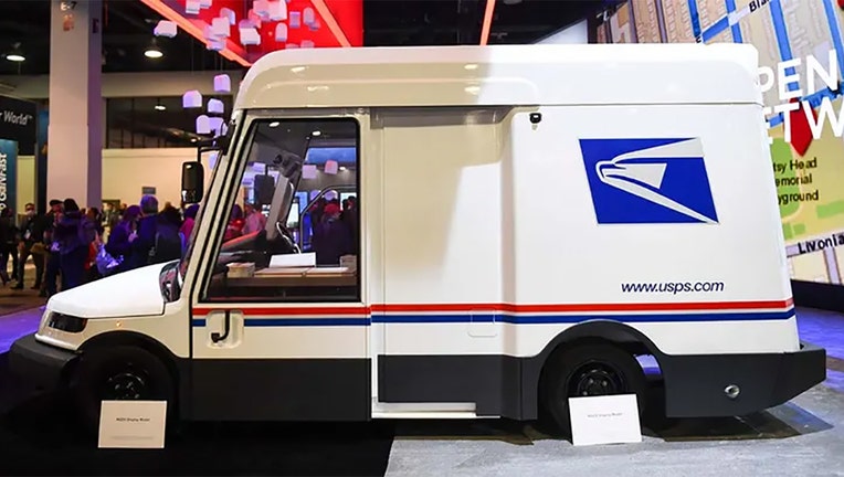 The U.S. Postal Service Next Generation Delivery Vehicle is displayed during the Consumer Electronics Show on Jan. 5, 2022 in Las Vegas. (Photo by PATRICK T. FALLON/AFP via Getty Images / Getty Images)