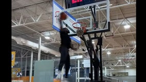 Former Harlem Globetrotter uses slam dunk for baby's gender reveal