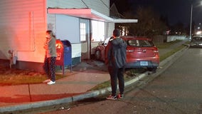 Hit-and-run driver damages house and totals other drivers car in Tacoma