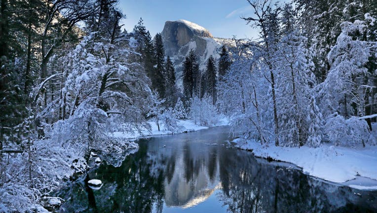 Its a winter wonderland in Yosemite National Park, with Half Dome reflected in the Merced River on Dec. 15, 2022.