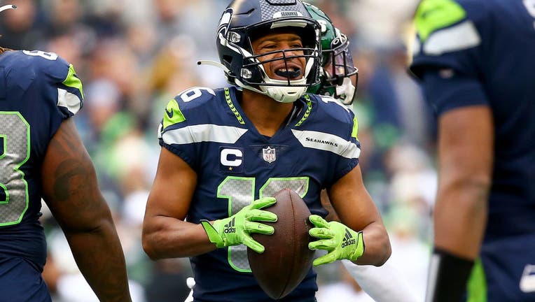 Tyler Lockett catches passes in walk-through, might play Sunday