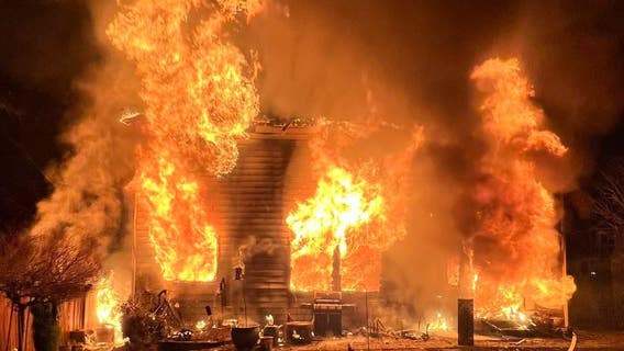 Crews investigate massive house fire in Mill Creek