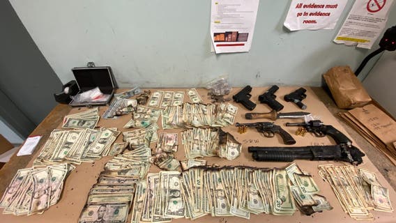 Guns, drugs, thousands in cash found after Seattle encampment fire