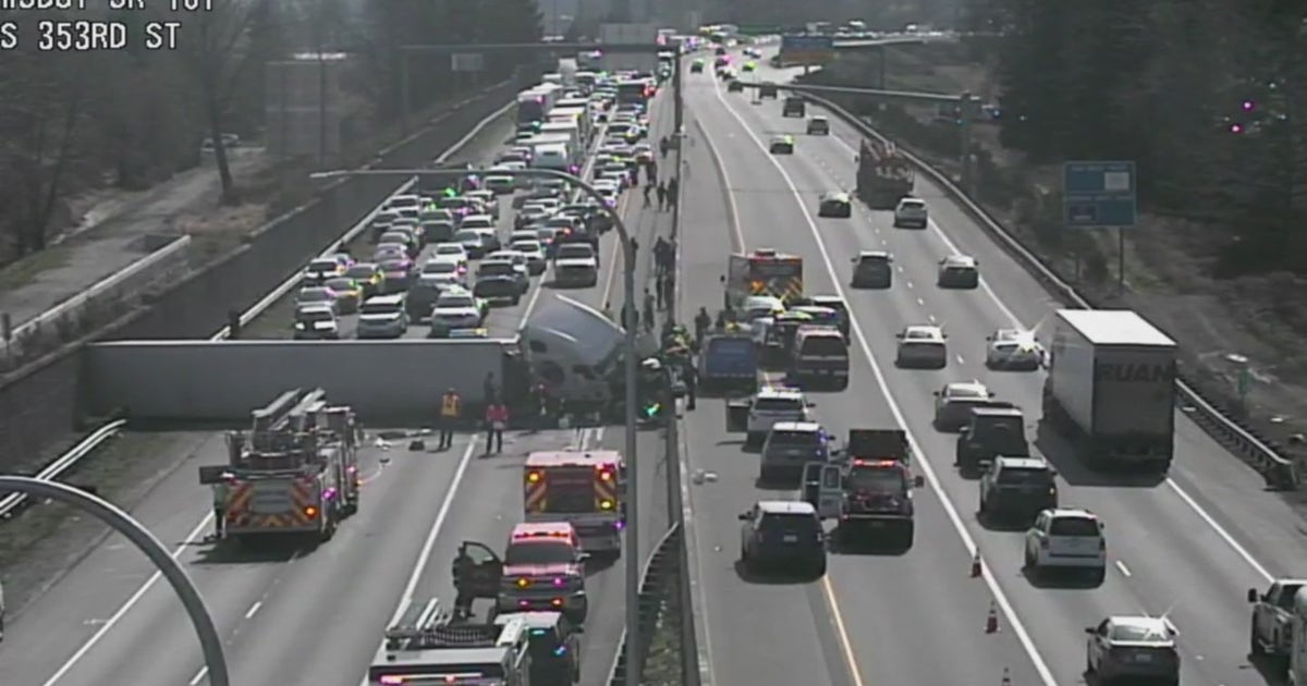 Semi-truck driver arrested on suspicion of DUI after rollover blocks ...