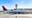 Passenger on flight from LAX to Seattle detained after opening emergency exit door