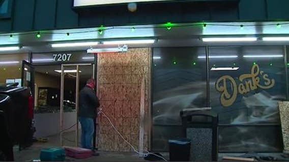 Van backs into Edmonds pot shop, damages entrance
