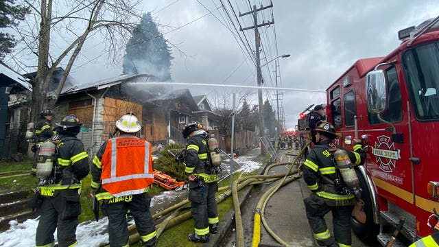 Fire rips through home just off I-5 in Seattle
