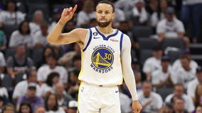 Curry scores playoff career-high 50 as Warriors down Kings