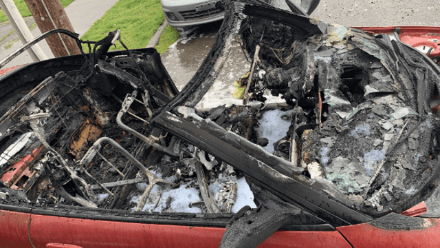 Suspicious car fire leads to arson arrest