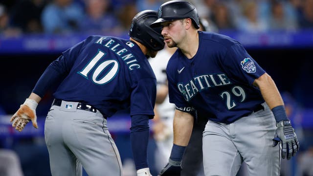 Cal Raleigh homers twice, Mariners rally to beat Blue Jays 10-8 in extras