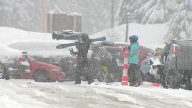 More snow falls over Snoqualmie Pass
